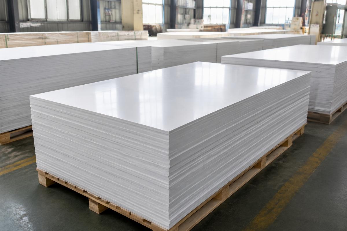 Finished furniture grade PVC foam board sheets stacked after production